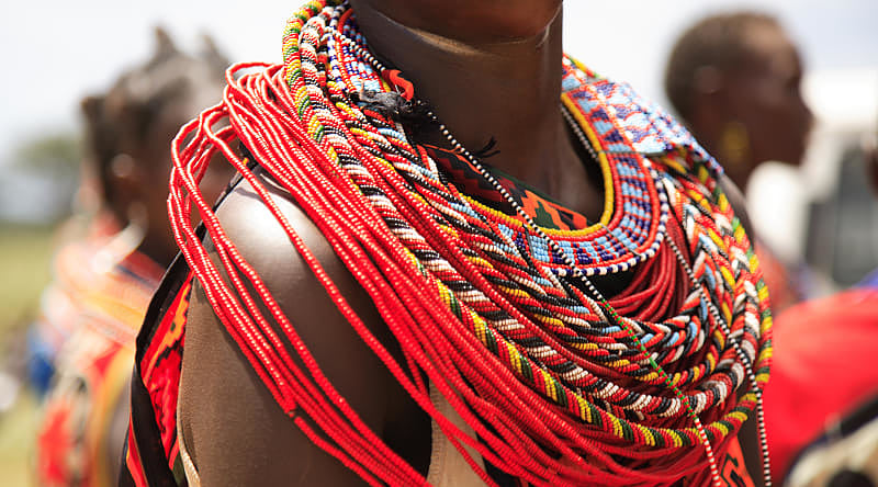 Beaded jewelry on a woman in Kenya Beaded jewelry on a woman in Kenya