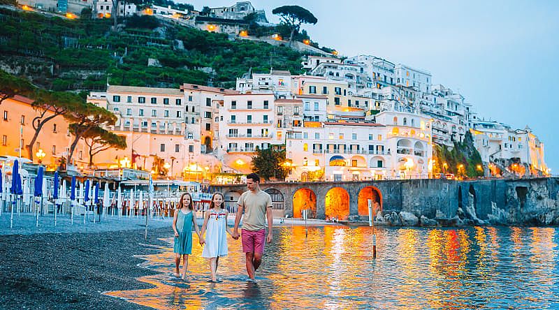 Father with his daughters on the Amalfi Coast in Italy