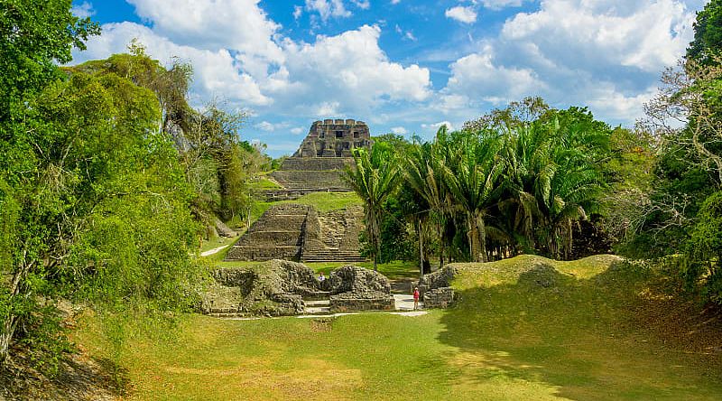 Xunantunich surrounded by lush jungle landscape in Belize