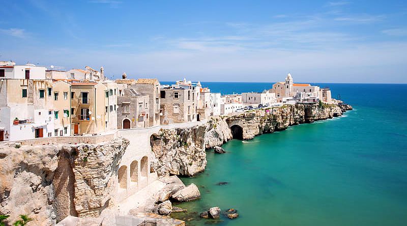 Beach town in Vieste, Italy on a sea cliff in Italy