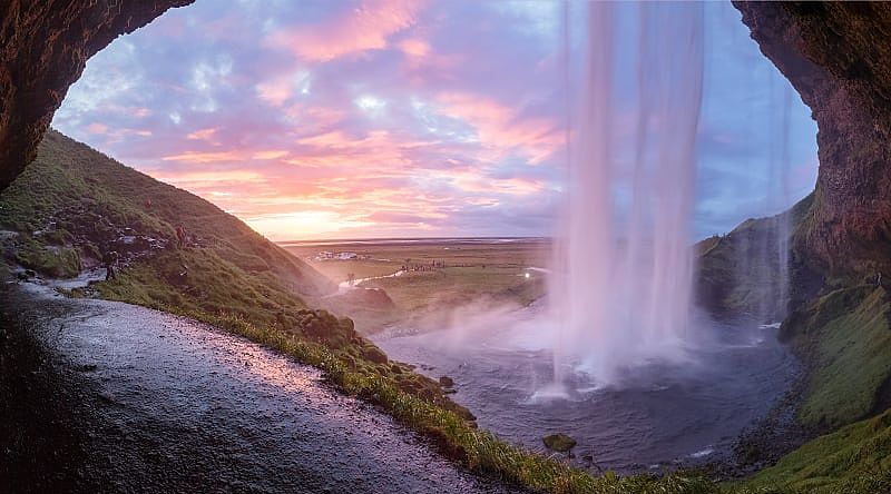 Experience a behind-the-scenes look at the glorious waterfall of Seljalandsfoss