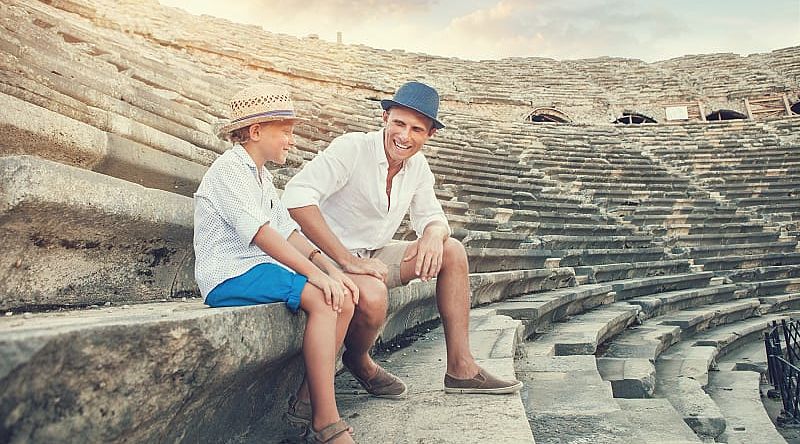 Hierapolis Ruins in Pamukkale, Turkey Father and son at Hierapolis ruins in Pamukkale, Turkey