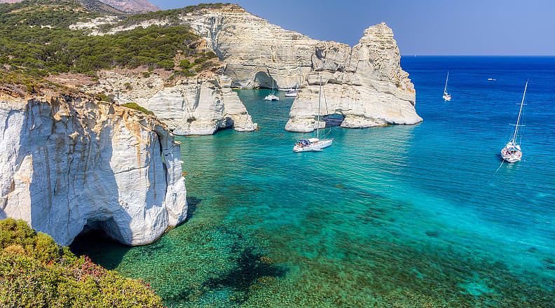 Sailing the coast of Milos island, Greece