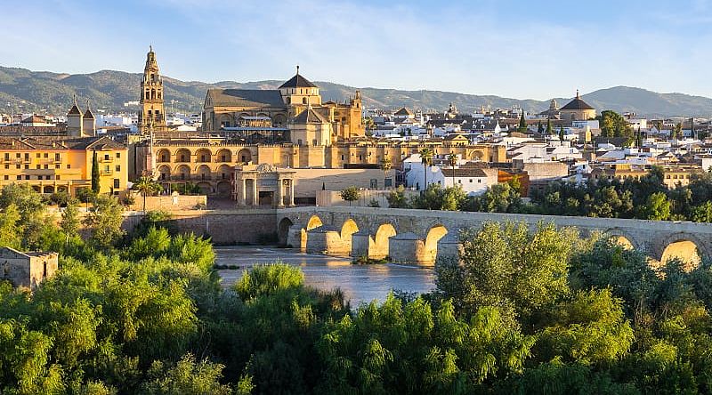 Morning view of the Cathedral, Mezquita and roman bridge in Córdoba, Spain