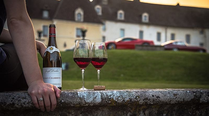 Enjoying an evening glass of wine at Château de Gilly near Dijon in the Burgundy region in France.