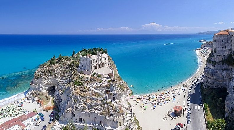 Coastline with beaches and Tropea castle in the Province of Calabria, Italy