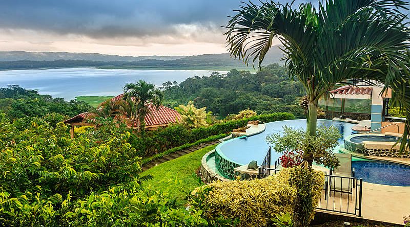 Luxurious vacation in the middle of the rainforest, view of the Arenal Lake and the jungle, Costa Rica Luxurious vacation in the middle of the rainforest, view of the Arenal Lake and the jungle, Costa Rica