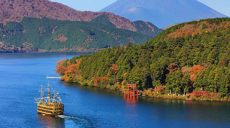 Mt Fuji and Lake Ashi with sightseeing pirate ship in Hakone National Park, Japan.