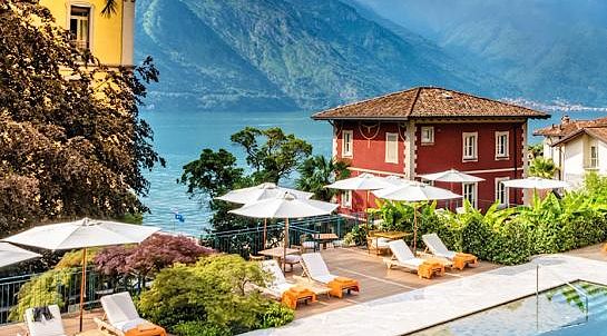 A swimming pool in front of Lake Como in Italy A swimming pool in front of Lake Como in Italy