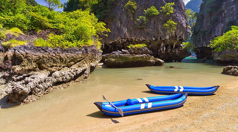 Two inflatable kayaks in Phang Nga Bay, Thailand Two inflatable kayaks in Phang Nga Bay, Thailand
