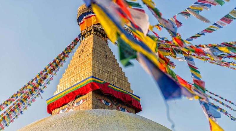 Boudhanath Stupa with prayer flags in Kathmandu, Nepal.