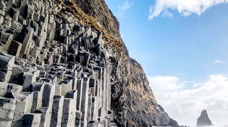 The black sand beach of Reynisfjara and the mount Reynisfjall