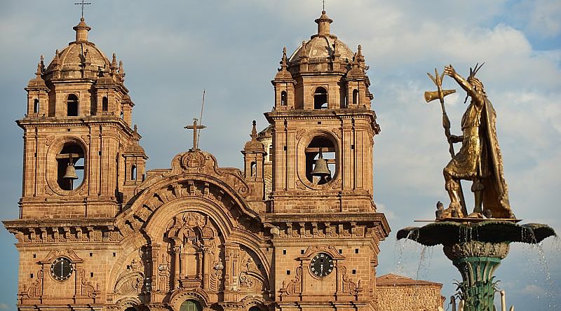 Golden statue on fountain at Cusco main square in Peru Golden statue on fountain at Cusco main square in Peru