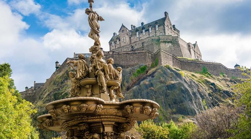 Fountain in front of Edinburgh Castle in Scotland Fountain in front of Edinburgh Castle in Scotland