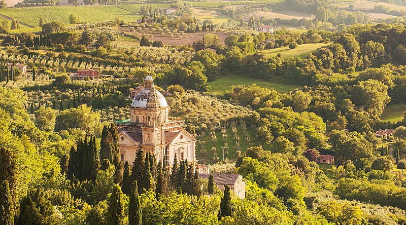 Church of San Biagio in Montepulciano surrounded by Tuscan countryside