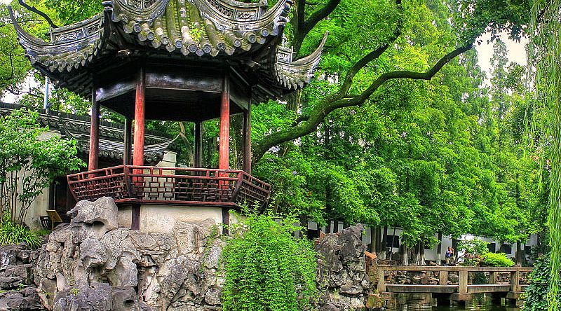 Shanghai Yu Yuan Gardens, along the calm waters and winding forest paths, China