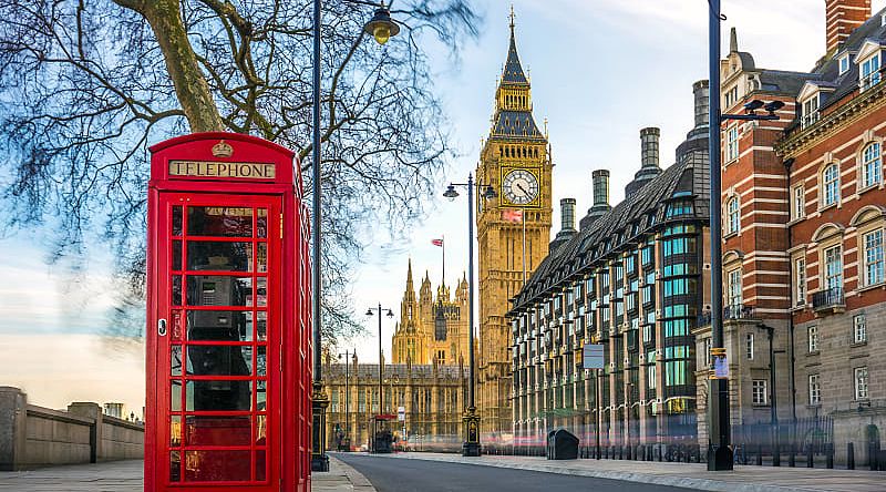 Classic red telephone box with Big Ben in London, England Classic red telephone box with Big Ben in London, England