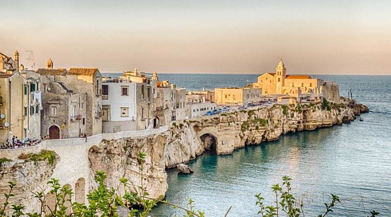 Beach town in Vieste, Italy on a sea cliff