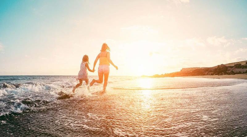 Mother and daughter at the beach in Australia