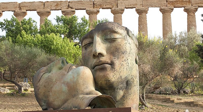 Sculptures by modern masters against the background of the ancient Temple of Juno, Valley of the Temples, Agrigento Sculptures by modern masters against the background of the ancient Temple of Juno, Valley of the Temples, Agrigento
