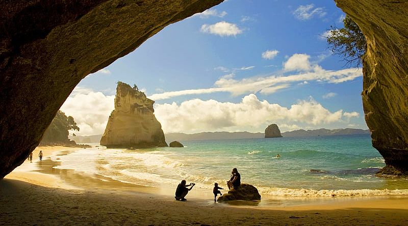 Family at Cathedral Cove in the Coromandel Peninsula, New Zealand Family at Cathedral Cove in the Coromandel Peninsula, New Zealand