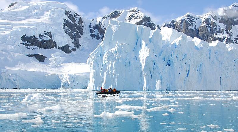 Exploring iceberg off the coast of Antarctica