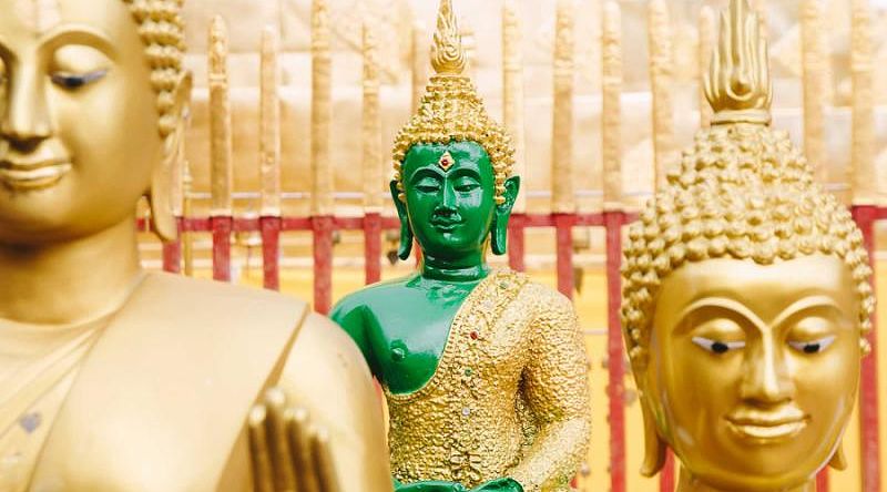 Statues in the golden Temple in Thailand