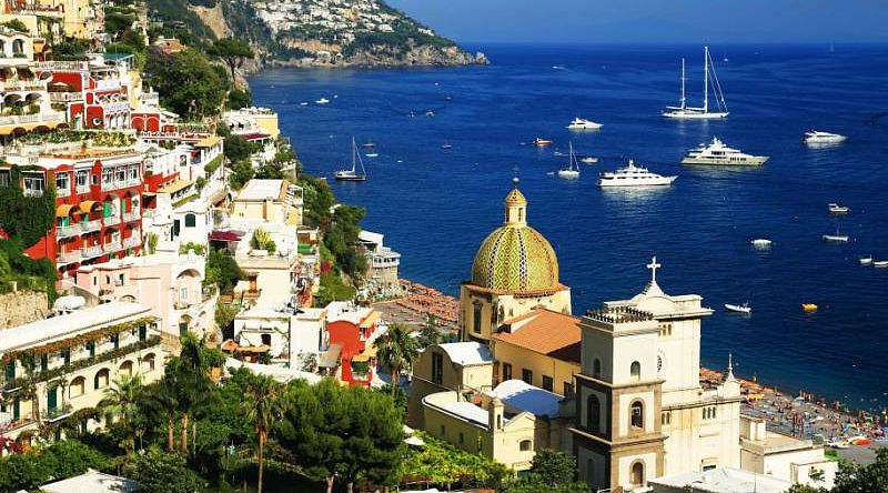 View of the colorful buildings and ocean of Positano, a cliffside village in the Amalfi Coast, Italy View of the colorful buildings and ocean of Positano, a cliffside village in the Amalfi Coast, Italy