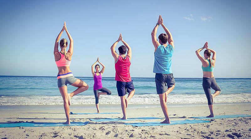 Yoga class on the beach in Bora Bora Yoga class on the beach in Bora Bora