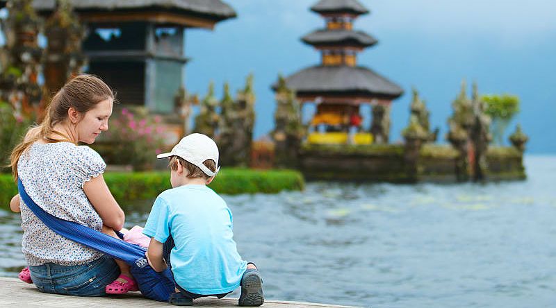 Mother and kids at Bratan Water Temple in Bali, Indonesia