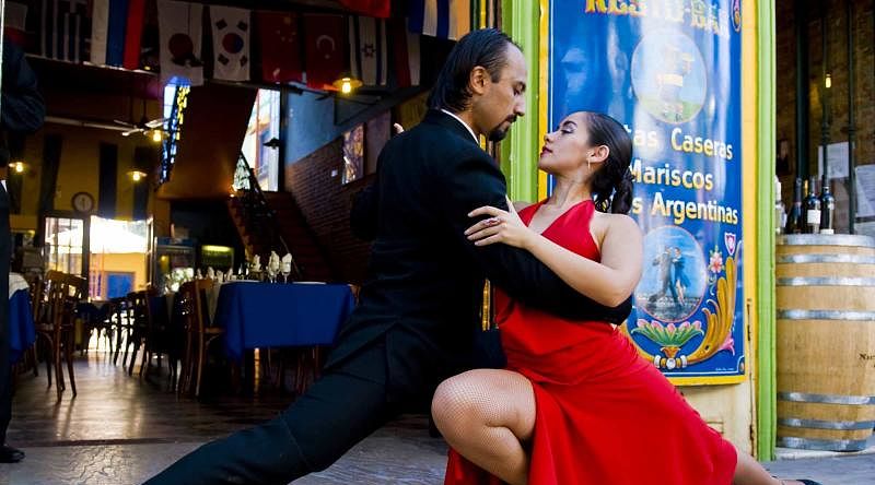 Learning to Tango in Buenos Aires Tour Couple dancing tango in the street, Buenos Aires