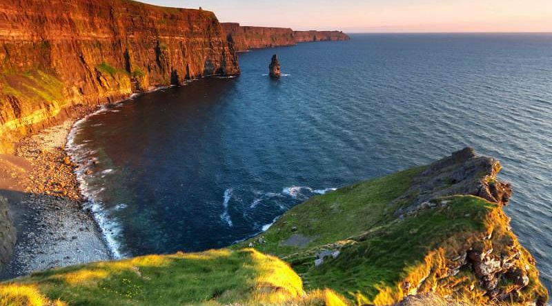 Walk along the coast to the famous Cliffs of Moher, Ireland Walk along the coast to the famous Cliffs of Moher, Ireland