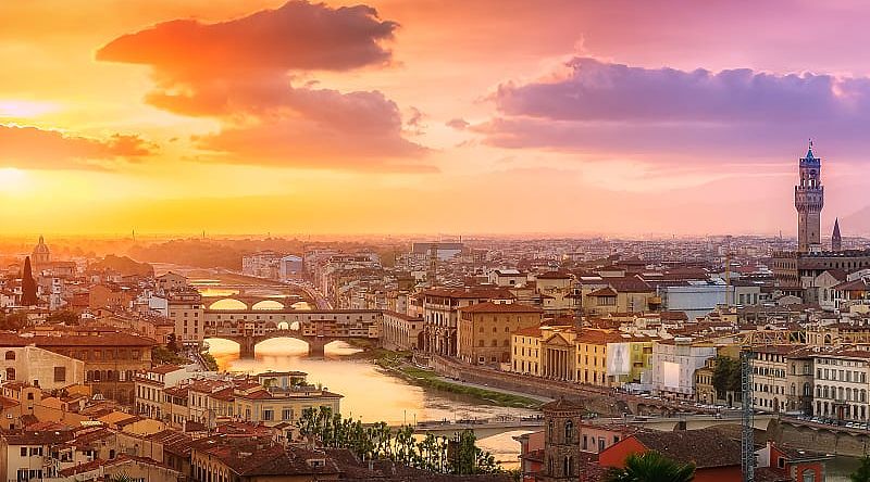 Romantic sunset over the Arno river in Florence, Italy