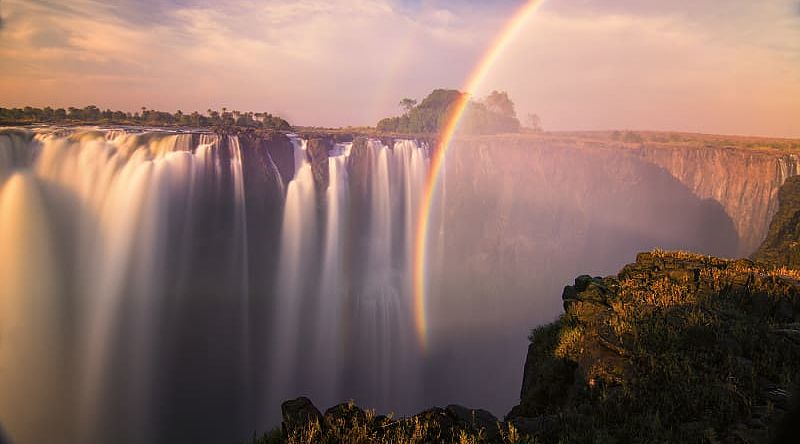 Rainbow over Victoria Falls in Zimbabwe Rainbow over Victoria Falls in Zimbabwe