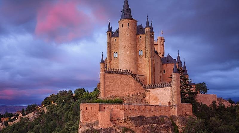 Alcazar of Segovia at sunset in Spain Alcazar of Segovia at sunset in Spain