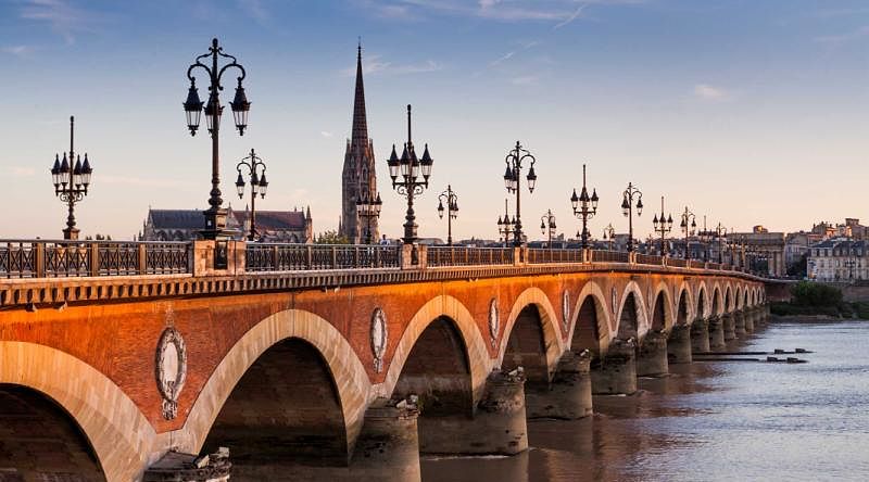 Bordeaux river bridge with St. Michel Cathedral in France Bordeaux river bridge with St. Michel Cathedral in France