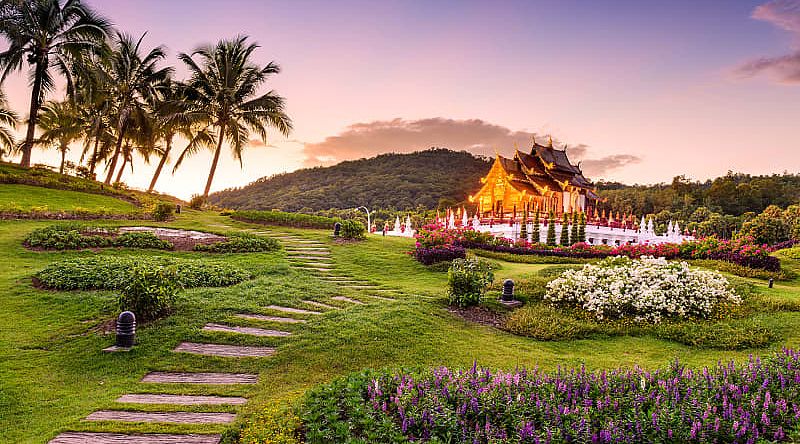 Pathway through gardens leading to Kor Khum Luang Temple at Royal Park Rajapruek in Chiang Mai, Thailand Pathway through gardens leading to Kor Khum Luang Temple at Royal Park Rajapruek in Chiang Mai, Thailand