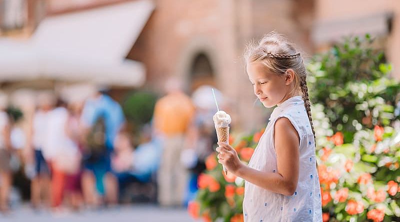 Young girl enjoying a gelato in Rome, Italy