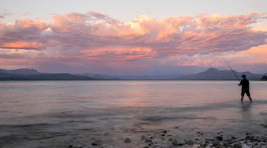 Fly fishing on Naheul Haupi Lake in Bariloche, Argentina