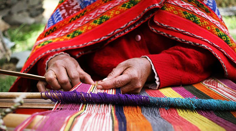 Close up of a woman weaving in Peru Close up of a woman weaving in Peru