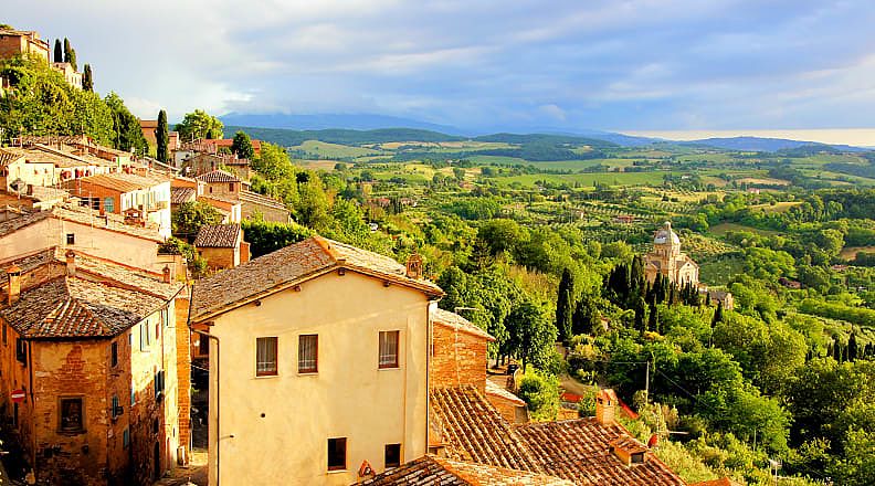 The hilltop town of Montepulciano surrounded by vineyards in Tuscany, Italy