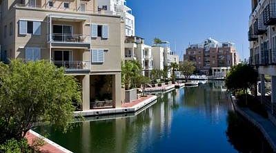 Houses on canal in Cape Town, South Africa.