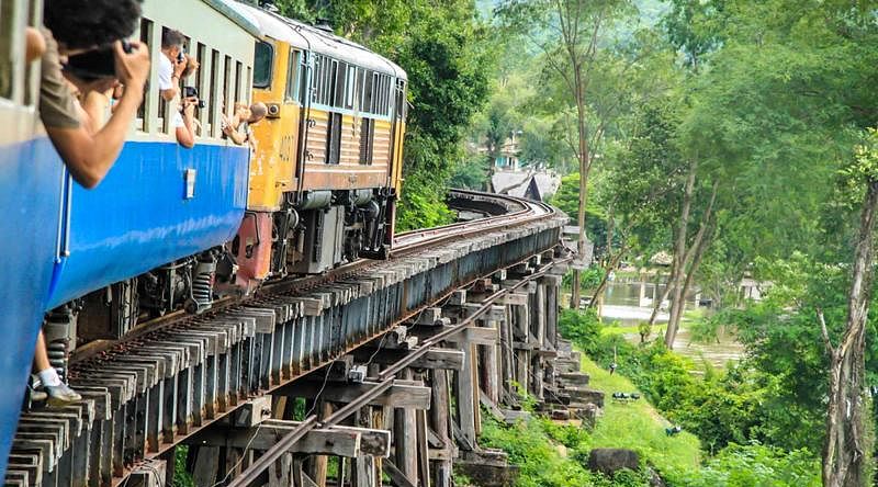 City & Nature Tour of Thailand: Bangkok’s Floating Markets, Royal Palace, Khao Yai & Kanchanaburi Thailand - The River Kwai Bridge serves as the only rail route to Kanchanaburi.