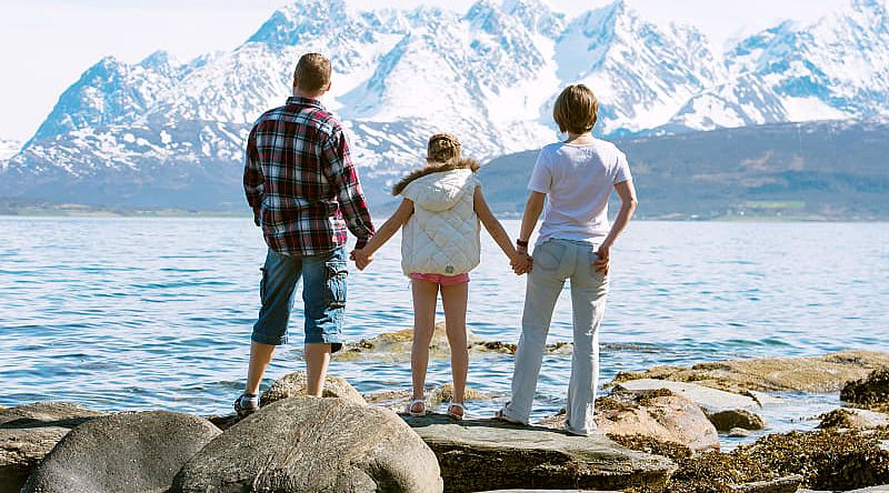 Family in coast of the Norwegian sea