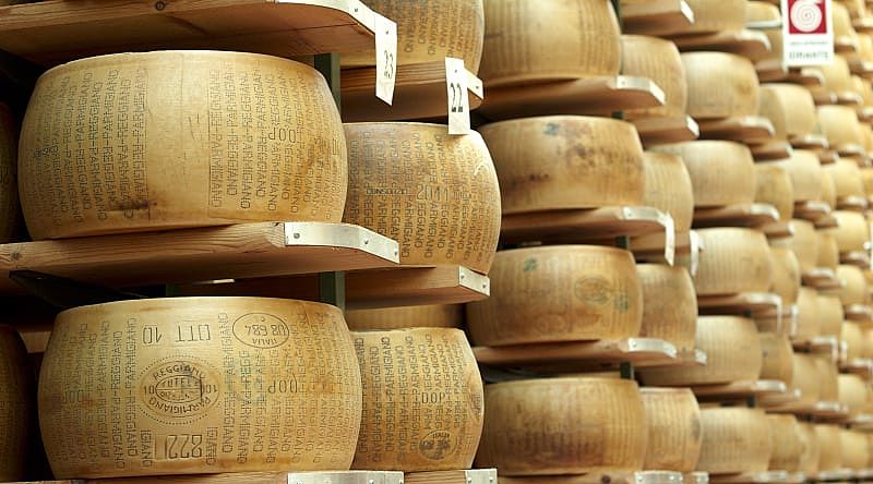 Wheels of parmigiano-reggiano on display in Parma, Italy