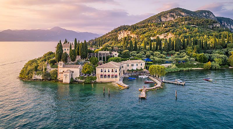 Enjoy breathtaking panoramic views of Lake Garda and the distant mountains.