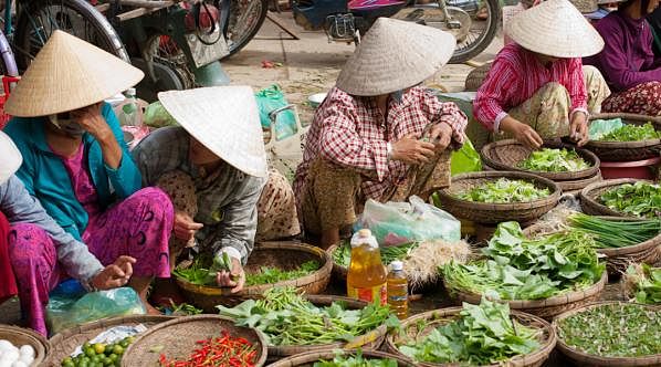 Vendors at the market in Hoi An, Vietnam Vendors at the market in Hoi An, Vietnam