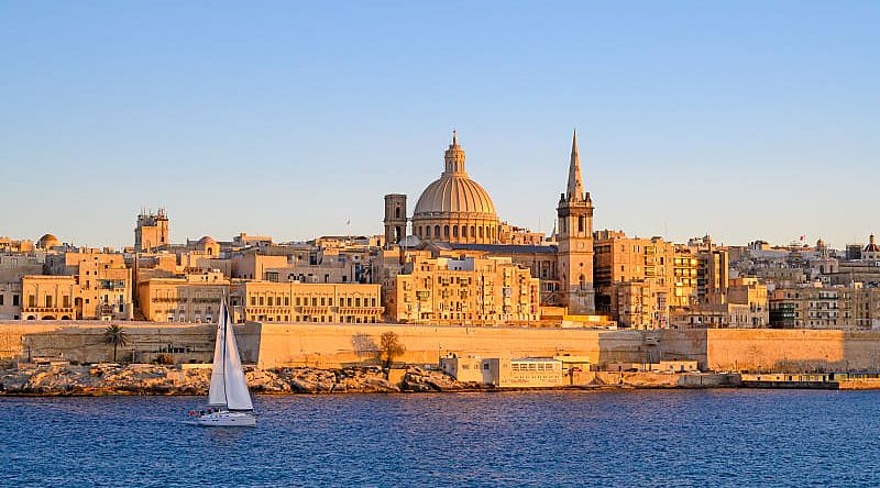 Sailboat along seafront of Valletta on the Island of Malta in the Mediterranean