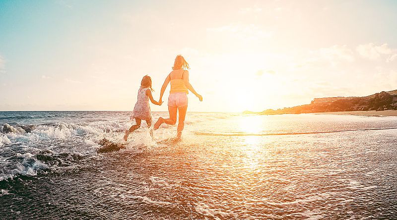 Mother and daughter at the beach in Australia Mother and daughter at the beach in Australia