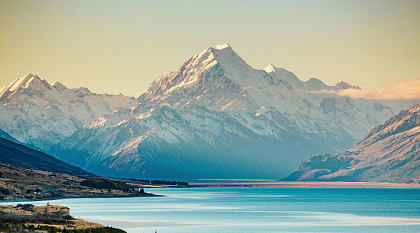 The dramatic peak of Mount Cook will dominate the skyline.